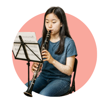 Student learning to play the clarinet in a Vancouver studio